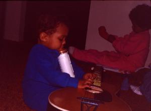 Sibs, a guitar, & a bottle.