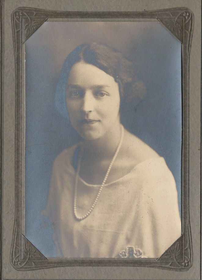 Graduation Graduation photo of Zelma Porter 1923. Sepia headshot of young woman in pearls.
